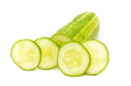 sliced cucumber isolated on white background.の写真素材