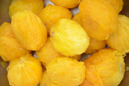 bunch the red yellow peels mango isolated in white backgroundの写真素材