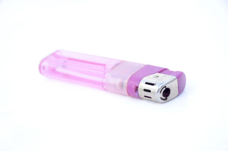 the purple color gas lighter isolated on white background.の写真素材