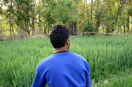 the young man enjoyed and relax with green nature.