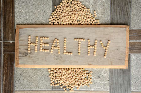 the yellow peas grain write the healthy healthcare medical concept wooden grey brown background.の写真素材