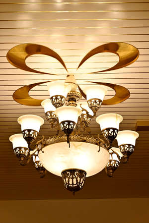 closeup the bunch yellow brown lighting bulb hanging on the floor soft focus natural brown background.の写真素材