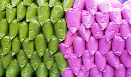 pouches of colors green purpleの写真素材