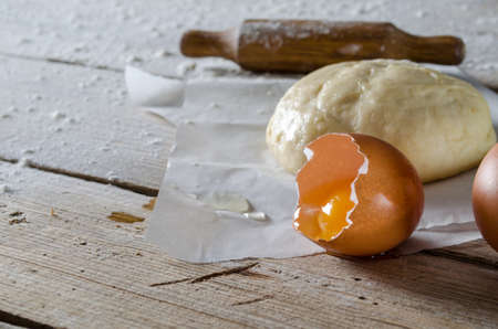 Dough preparation. Baking ingredients: egg and flour.