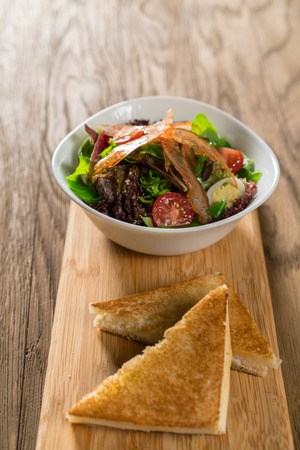 Fresh breakfast Omelette Salad with Parma Ham, feta cheese and vegetables.の写真素材