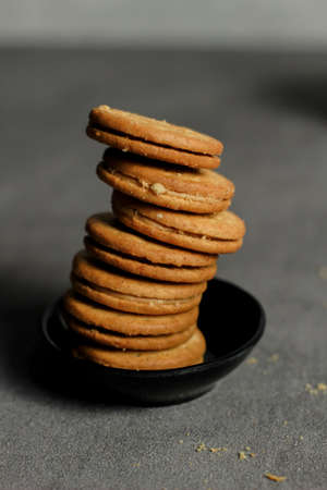 a glass of milk and biscuits for a healthy breakfast. suitable for diet program.