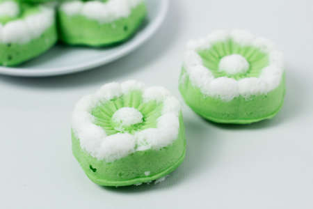 Putu Ayu traditional Indonesian cake. The cake is green with the aroma of pandan and grated coconut...