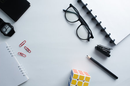 office stationery on white background with rubic