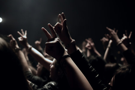 Crowd at concert, hands raised up, music festival, live concertの素材
