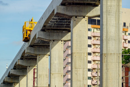 August 4 2022: A construction site of new projects of traffic bridge and tracks and columns of...