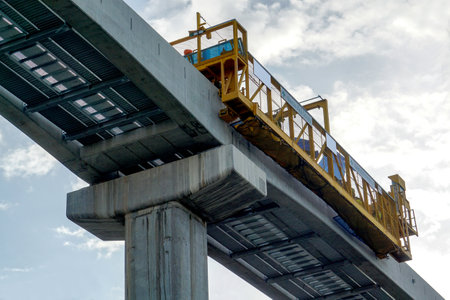 August 4 2022: A construction site of new projects of traffic bridge and tracks and columns of...