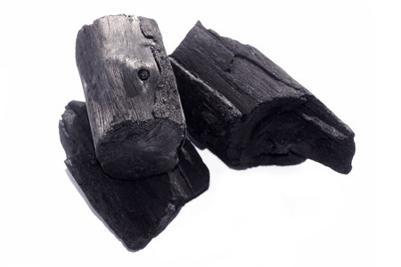 Natural wood charcoal, traditional charcoal or hard wood charcoal isolated on white background. - Imageの写真素材