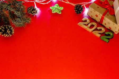 New year 2022 greeting card with copy space on red background.