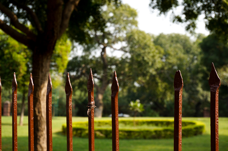 Sharp fence enclosing a feild   Can be used to illustrate forbidden, restricted, barred or other conceptsの写真素材
