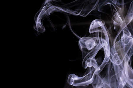 Abstract design using smoke on a black backgroundの写真素材