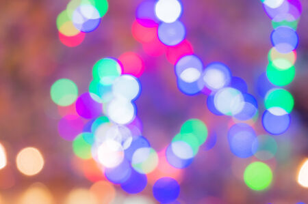 Out of focus multicolored lights to be used as a background or bckdropの写真素材