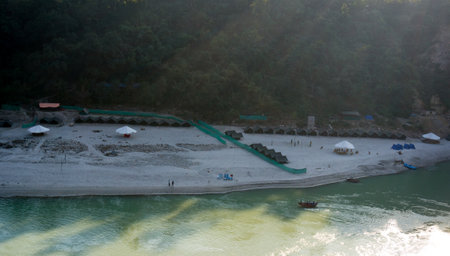 Rishikesh, Himachal Pradesh; 6th dec 2014 - A riverside camp with tents and outdoor sports. Such...