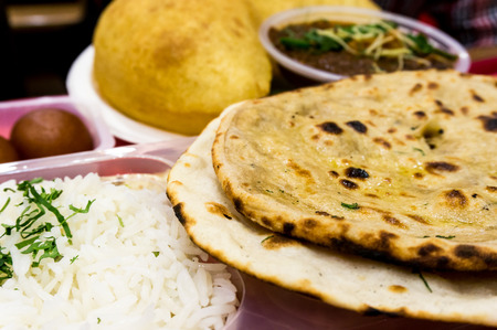 Rice, pulses (dal), Flat bread (roti nan) served together for a typical north indian meal.の写真素材