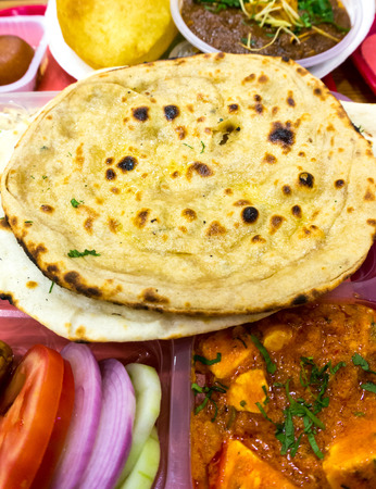 Rice, pulses (dal), Flat bread (roti nan) served together for a typical north indian meal.の写真素材