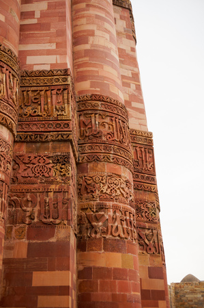 Carving details, beautiful patterns on the outside walls of Qutub minar in Delhiの写真素材