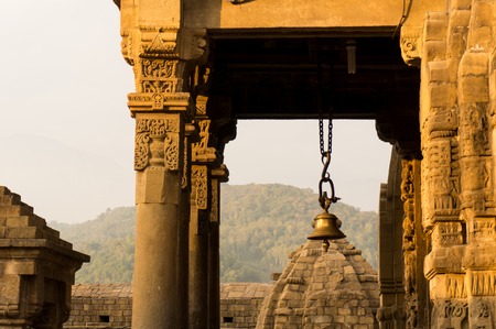 Bell and pillars at the entrance to the Shiva temple at Baijnath in India. This is a very popular tourist destination in Himachal Pradesh indiaの写真素材