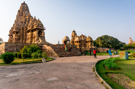 Khajurao, India, 6th Dec 2015: well laid out and green temple complex in the ancient city of Khajurao India. The complex complements the beautiful hindu jain templesのeditorial素材
