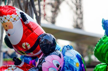 Santa claus and other baloons for christmas celebrationsの写真素材