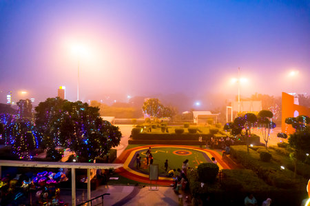 Delhi, India - 6th Nov 2016: Foggy smog filled evening at Select citywalk shopping mall in Delhi. This popular hangout place was empty owing to the dense pollutionのeditorial素材