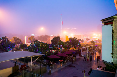 Delhi, India - 6th Nov 2016: Foggy smog filled evening at Select citywalk shopping mall in Delhi. This popular hangout place was empty owing to the dense pollutionのeditorial素材