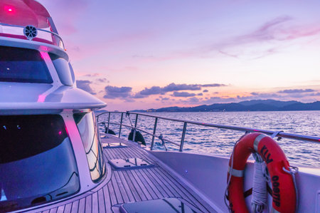 Deck of a luxury yacht shot during the purple light of duskのeditorial素材