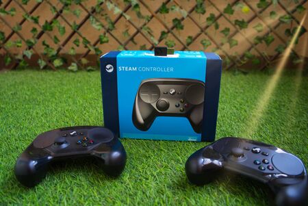 Photograph of Steam Controller by Valve Circa 2019- Steam Controller by Valve with its original box...