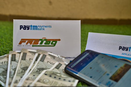 Gurgaon - India, Circa 2019: Photograph of Fast Tag and its application form provided by PayTM...