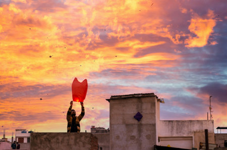 Jaipur, India - 14th Jan 2017: People release a chinese lantern into the air as part of Makar Sankranti or Uttaryan celebration in Rajasthan India. This is a recent trendのeditorial素材