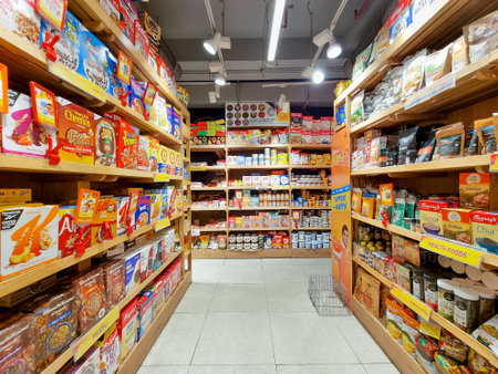 FMCG products on shelf with colorful packaging showing easy to make and eat products health foods and more made by companies like unilever, nestle, kellogs and moreのeditorial素材