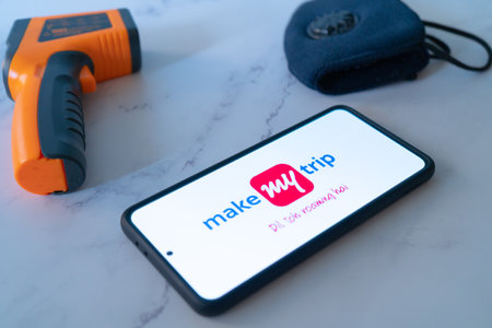 Indian startup unicorn invested company make my trip which is in the travel and hospitality industry which has geared for the coronavirus covid19 pandemic with thermometer and masks for safetyのeditorial素材