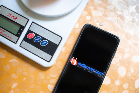 Indiamart intermesh B2B marketplace IPO company in India with digital weighing scale and rubiks cube showing the puzzle of business to business shoppingのeditorial素材