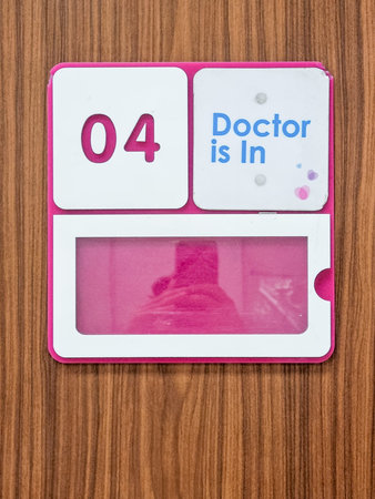 Doctor is in clinic room sign number 04