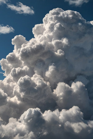 beautiful cumulus clouds in the blue sky as a background.の素材