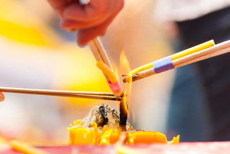 lighting the candleの写真素材