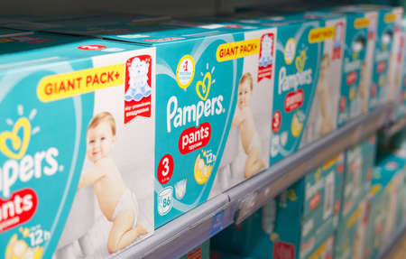 store shelf with Pampers giant pack pants for children