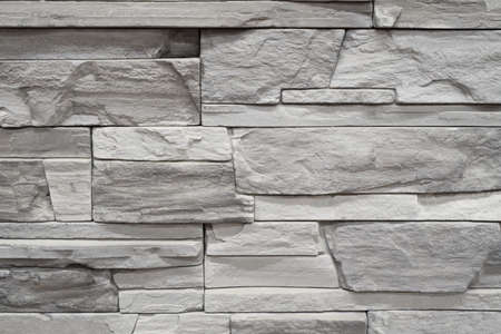 Stacked slate bricks wall texture, rough stone