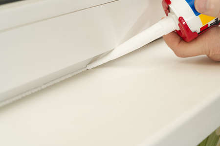 nozzle from which the silicone sealant flows, sealing the gap between