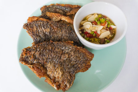 Green tea latte art with cute bear on wooden tray background.の写真素材
