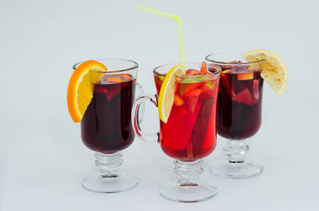 Mulled wine in glass with lemonの写真素材