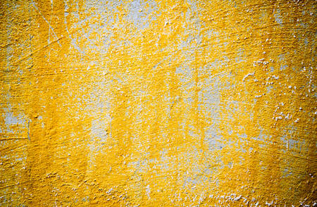 texture of old yellow wall colorの写真素材