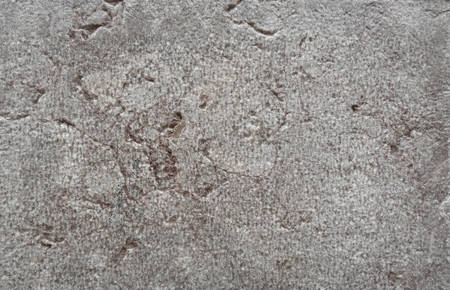 Texture of marble is gray-beige with a large pattern-cracks, spots.