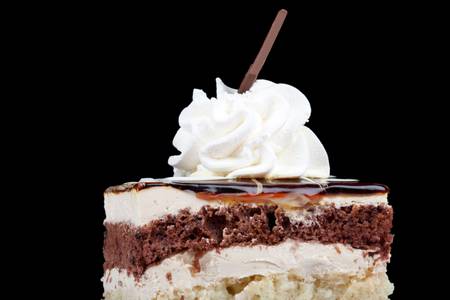 delicious cookie with caramel cream and whipped cream on top.の写真素材