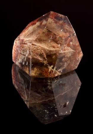 Smokey quartz is a brown to black variety of quartz caused through the natural irradiation of aluminium containing rock crystalの写真素材