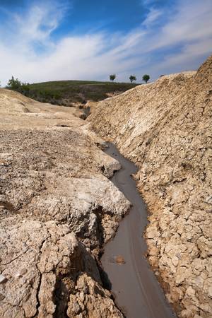 The Berca Mud Volcanoes are a geological and botanical reservation located in the Berca commune in the Buzãu County in Romania.の写真素材