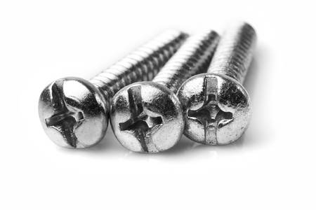 three philips head screw or cross head screww, isolated on white, studio shot